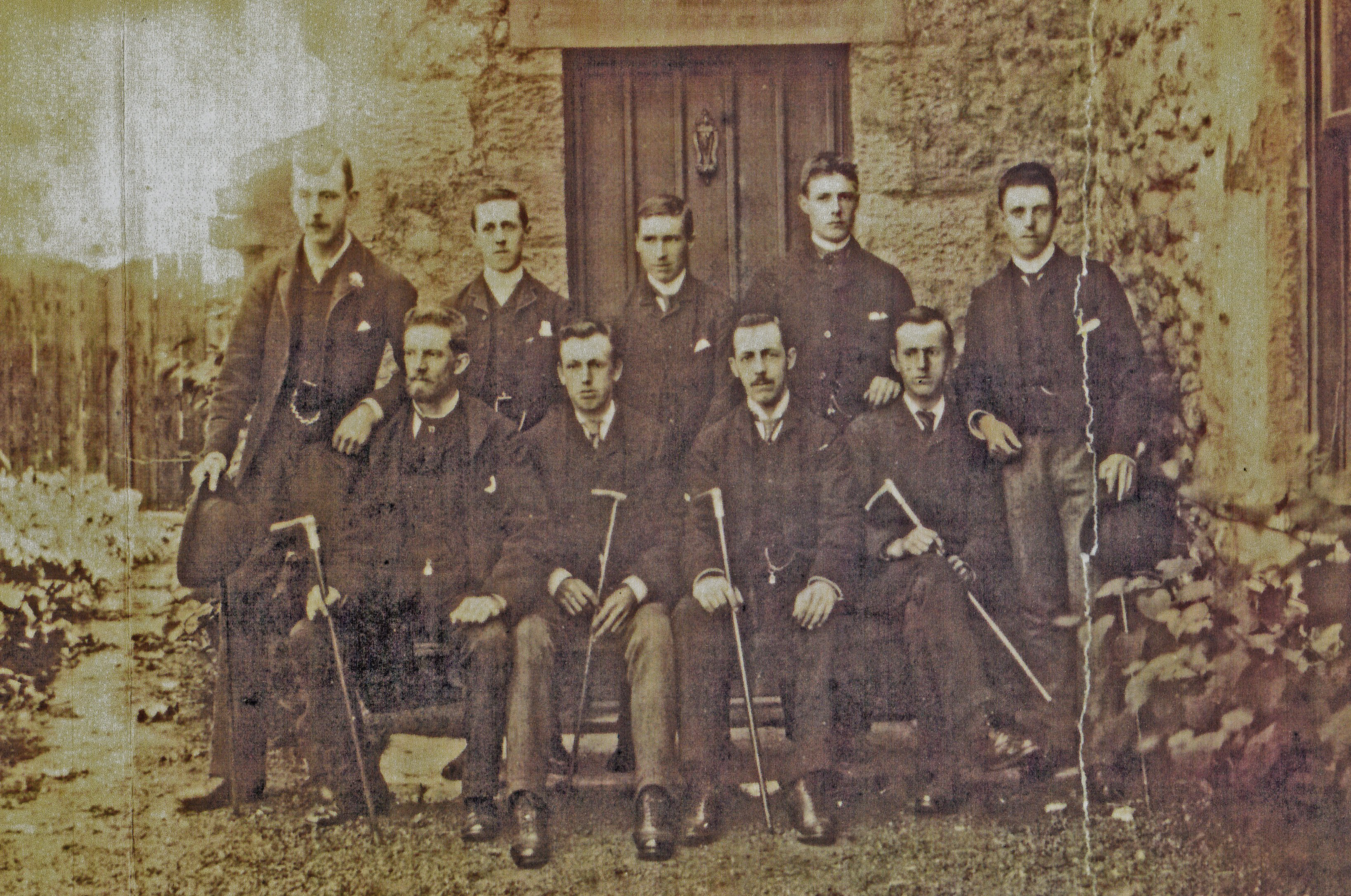 9 men outside Heaton Town Farm including members of the Edgar Family